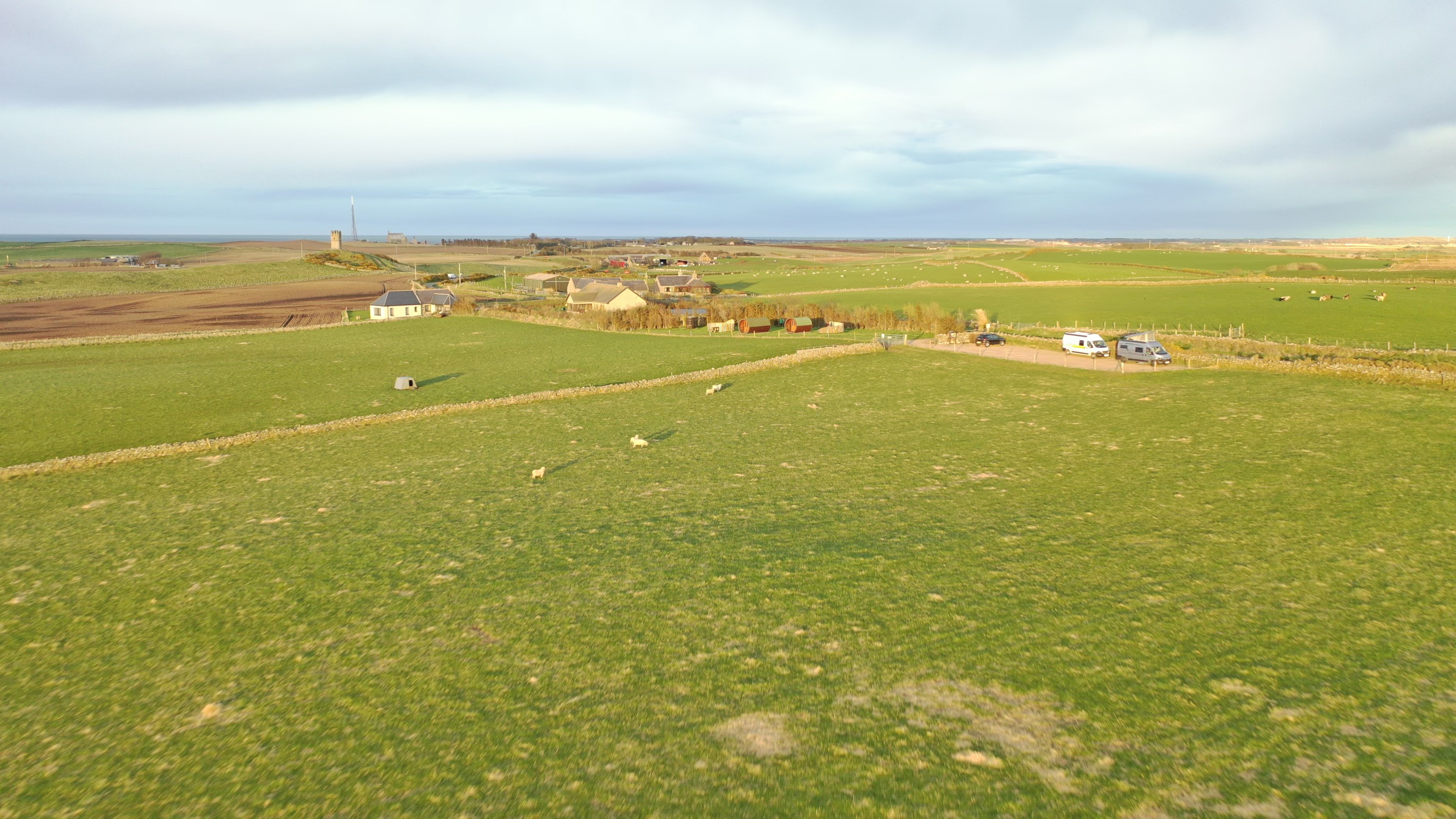Aerial view of Down on the Farm near Rosehearty — coastal sheep farm on the north Aberdeenshire coast