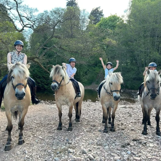 Riders on the Ancient Wood of Caledon route at Glen Tanar — through old-growth Scots pine on Royal Deeside